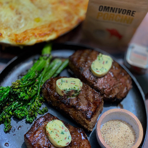 Angelo's Porcini Encrusted Steak with a Compound Butter, Scalloped Potatoes and Broccoli Rabe