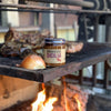 Organic sauce jar on grill