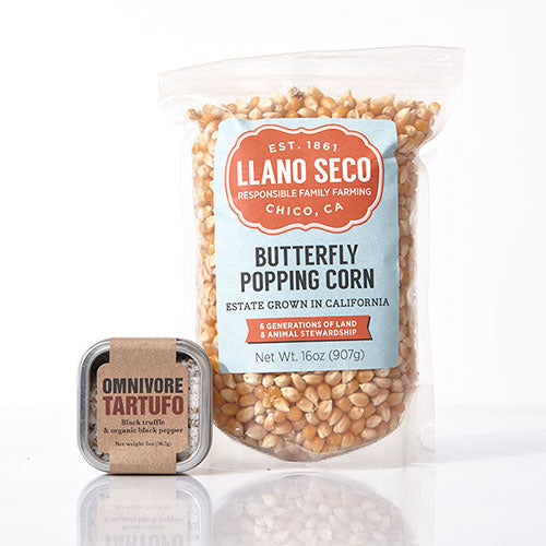 a bag of Butterfly Popcorn with a 2 oz tin of  Trtufo-Truffle Salt 